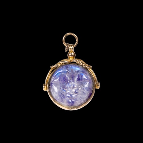 A 1920 gold and labradorite swivel pendant. Man in the moon